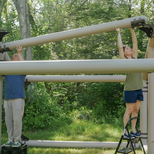 Assembling the HAVN inflatable greenhouse frame outdoors