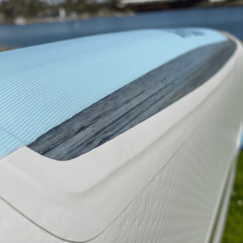 Air Core Composite rail overlay detail on an inflatable paddleboard