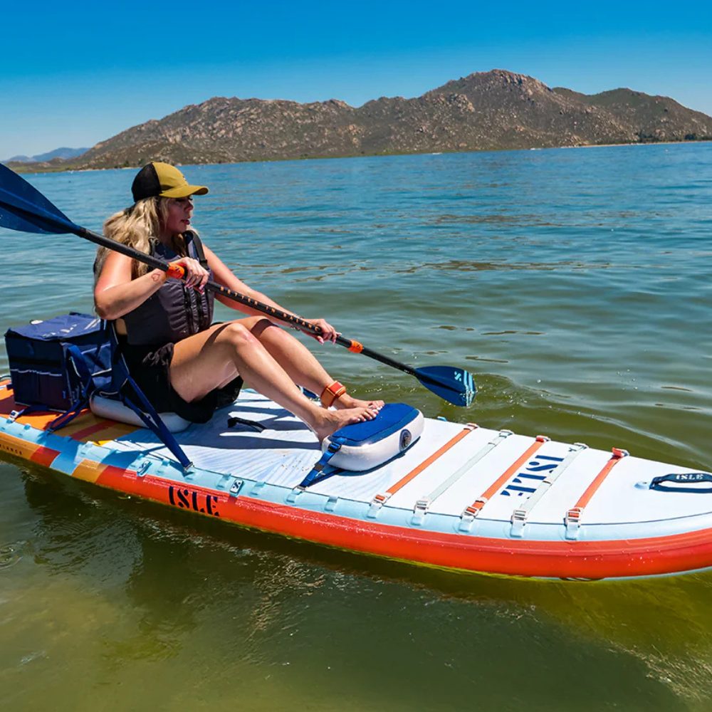 Paddler using the Cloud Kayak Seat on an Isle 2-in-1 hybrid inflatable paddleboard and kayak